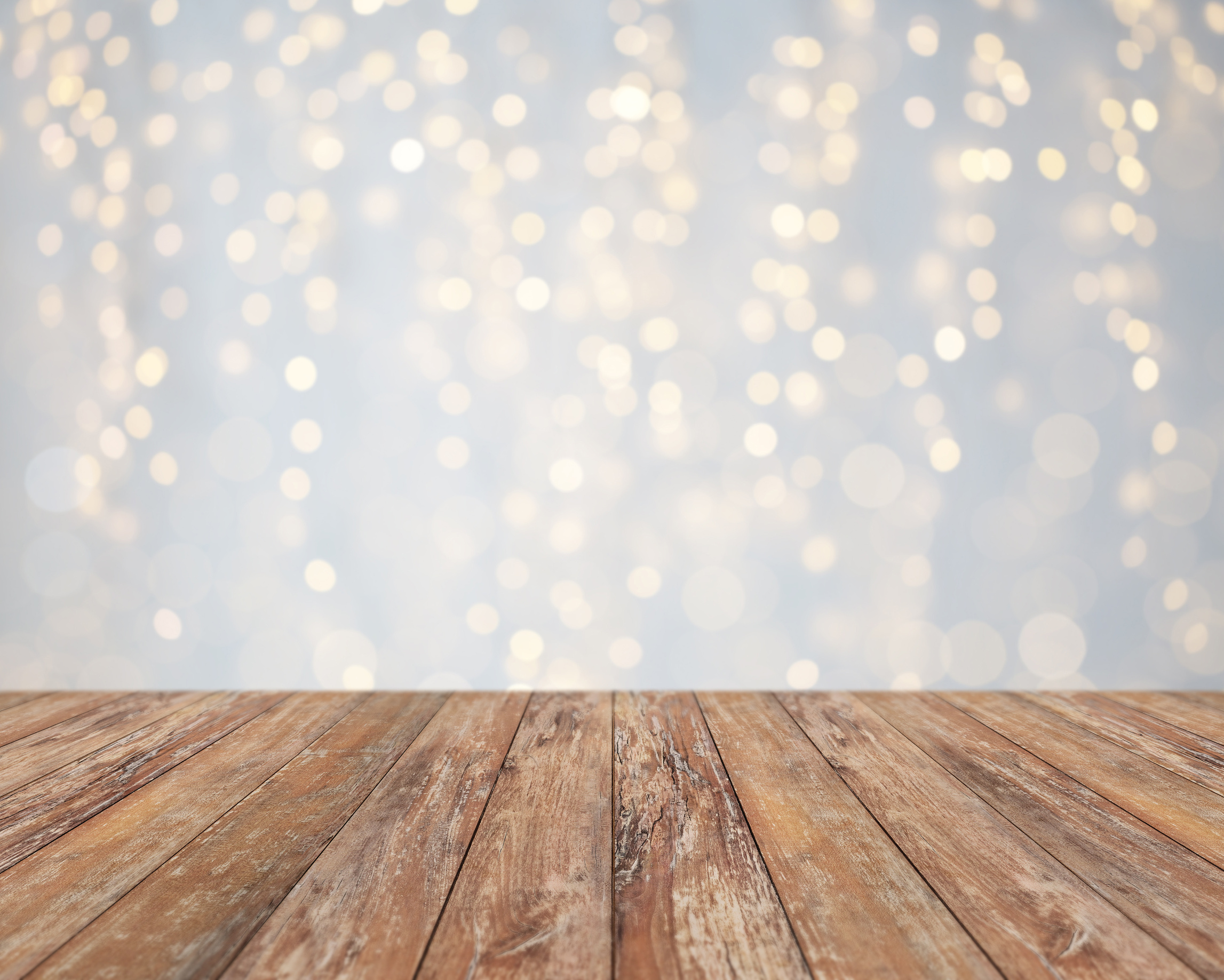 Empty Wooden Table with Christmas Golden Lights